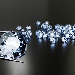 The diamond is clamped with pliers. Lots of diamonds placed on the table as background. 3D Rendering